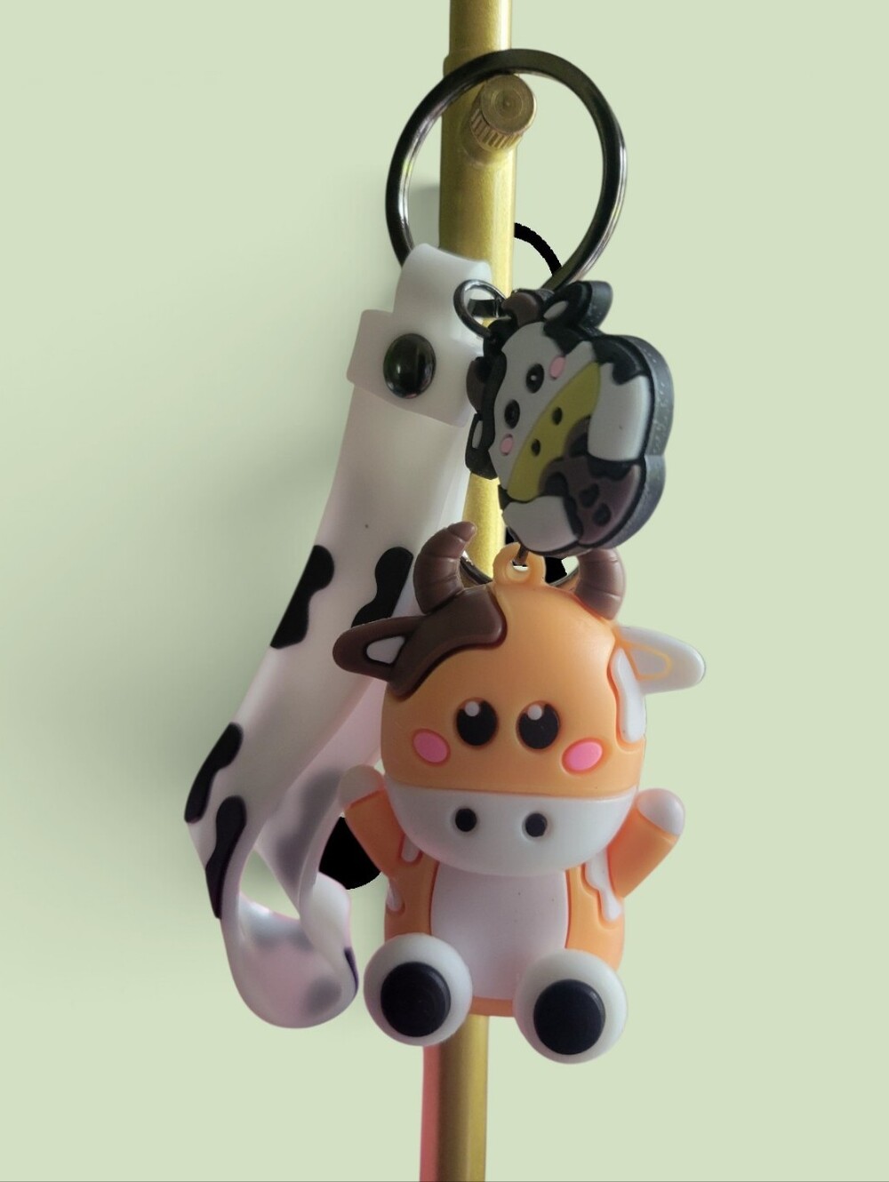 Cute Orange Cow Keychain with Black & White Strap